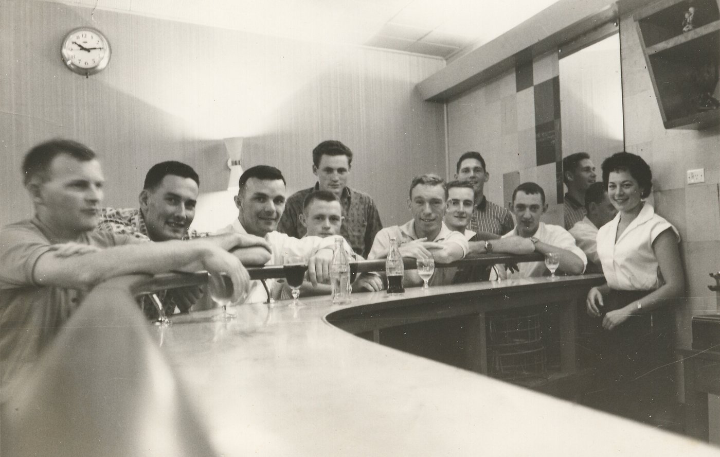 Howard Morris with his crew at a bar, on standby during the early NASA Mercury missions